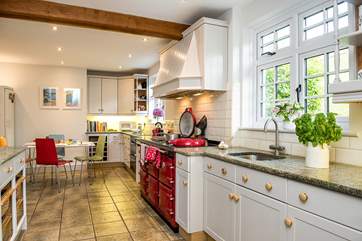 The kitchen/breakfast-room runs along the back of the house.