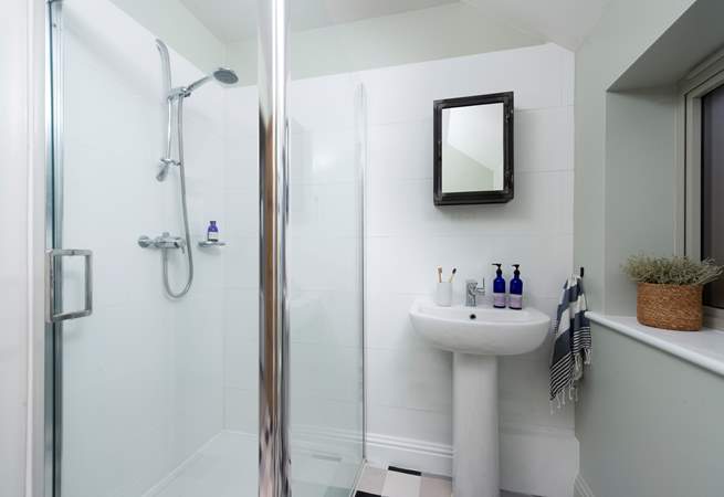 Bedroom 1 has an en suite shower-room.