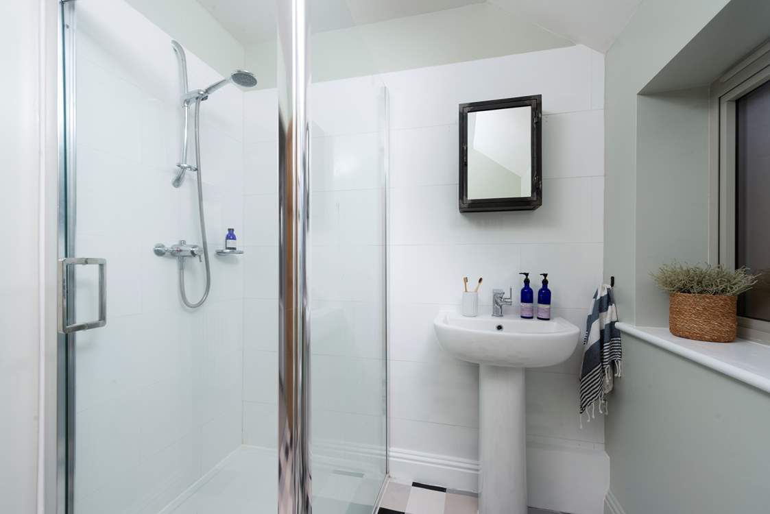 Bedroom 1 has an en suite shower-room.