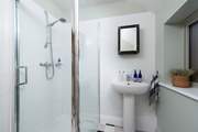 Bedroom 1 has an en suite shower-room.