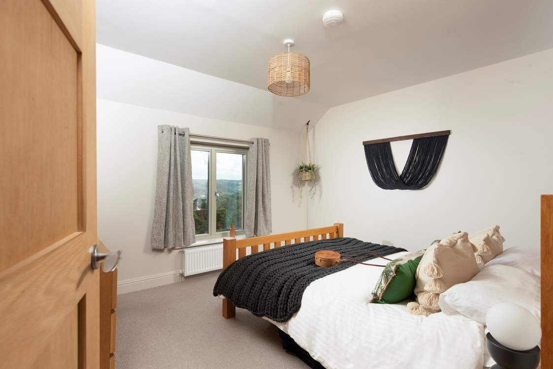 Bedroom 2 with king-size bed.