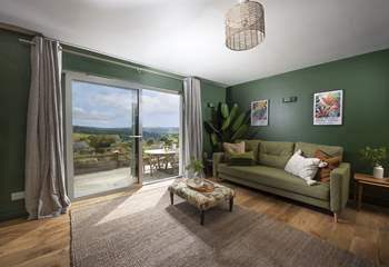The large windows in the sitting-room make the most of those gorgeous views.