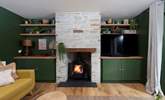 The wood-burner will be a welcome sight on chillier evenings. - Thumbnail Image