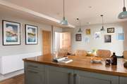You can grab a quick snack at the breakfast-bar, or gather at the dining-table when you want to dine together.
