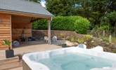 Soak away in the bubbly hot tub and enjoy the peace of the countryside. - Thumbnail Image