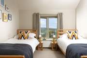 One of the charming twin bedrooms.