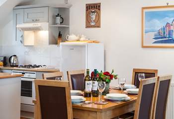 The open plan dining-area is the perfect spot to reflect on the day's adventures over a glass or two of wine.