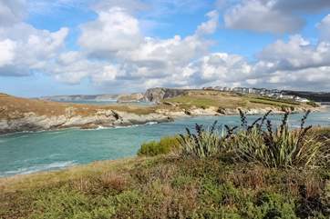 Porth Island is accessible over a sturdy wooden bridge and the views beyond stretch past Watergate Bay to Trevose Head in the distance.