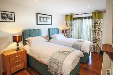 Room 2 is a lovely twin or double which also has a pull out single bed, so could sleep three children.