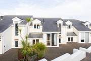 Puffin is a two-storey house, in a small horseshoe of 15 properties, nestled above the beach. You can access the property either via a ramp or flight of steps. The parking bay is a short walk away from the property.