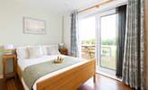 This lovely bedroom has French windows out to your decking.  - Thumbnail Image