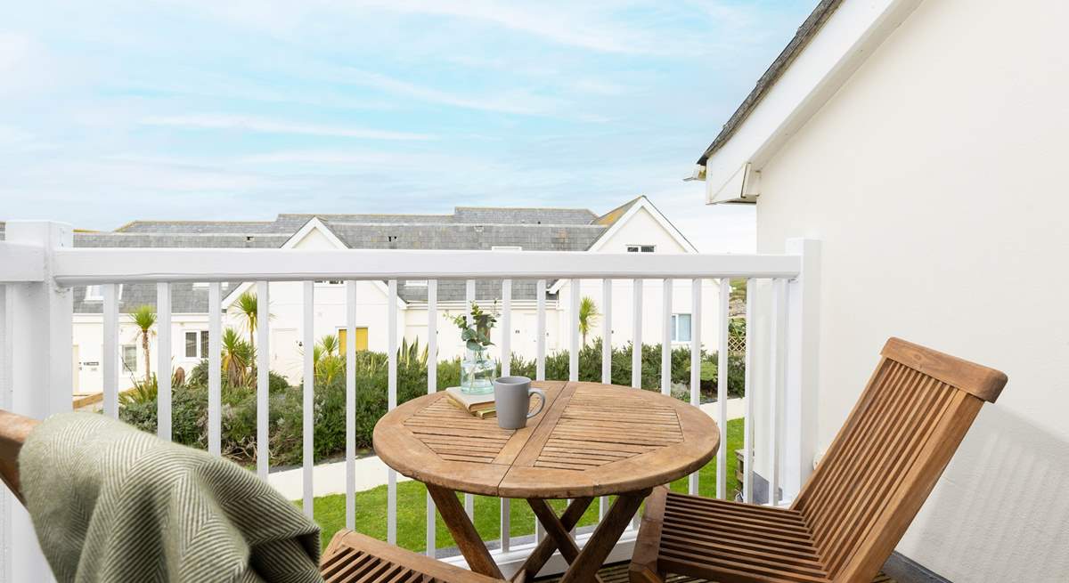 Double doors open to the balcony where to can just about see the sea from the side. What a lovely spot for your morning coffee.