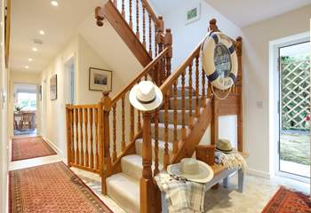 Stairs lead up to two spacious bedrooms.