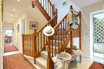 Stairs lead up to two spacious bedrooms.