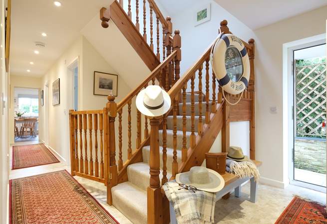Stairs lead up to two spacious bedrooms.
