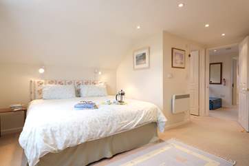 Bedroom 2 has views over the rear garden.