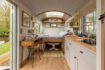 The clever fold-down bed allows you to make the most of this unique space.