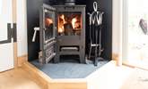 The warming wood-burner keeps the hut toasty in the cooler months. - Thumbnail Image