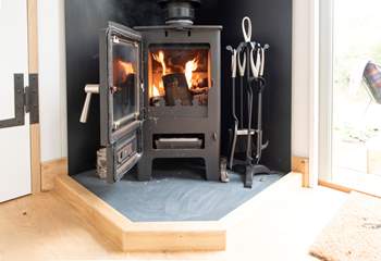 The warming wood-burner keeps the hut toasty in the cooler months.