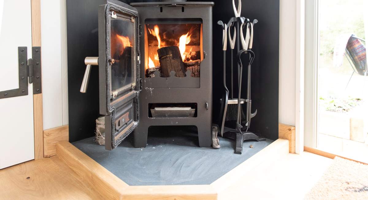 The warming wood-burner keeps the hut toasty in the cooler months.