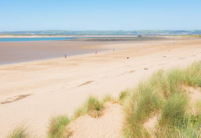 Instow beach has miles of sand and dog friendly year round.