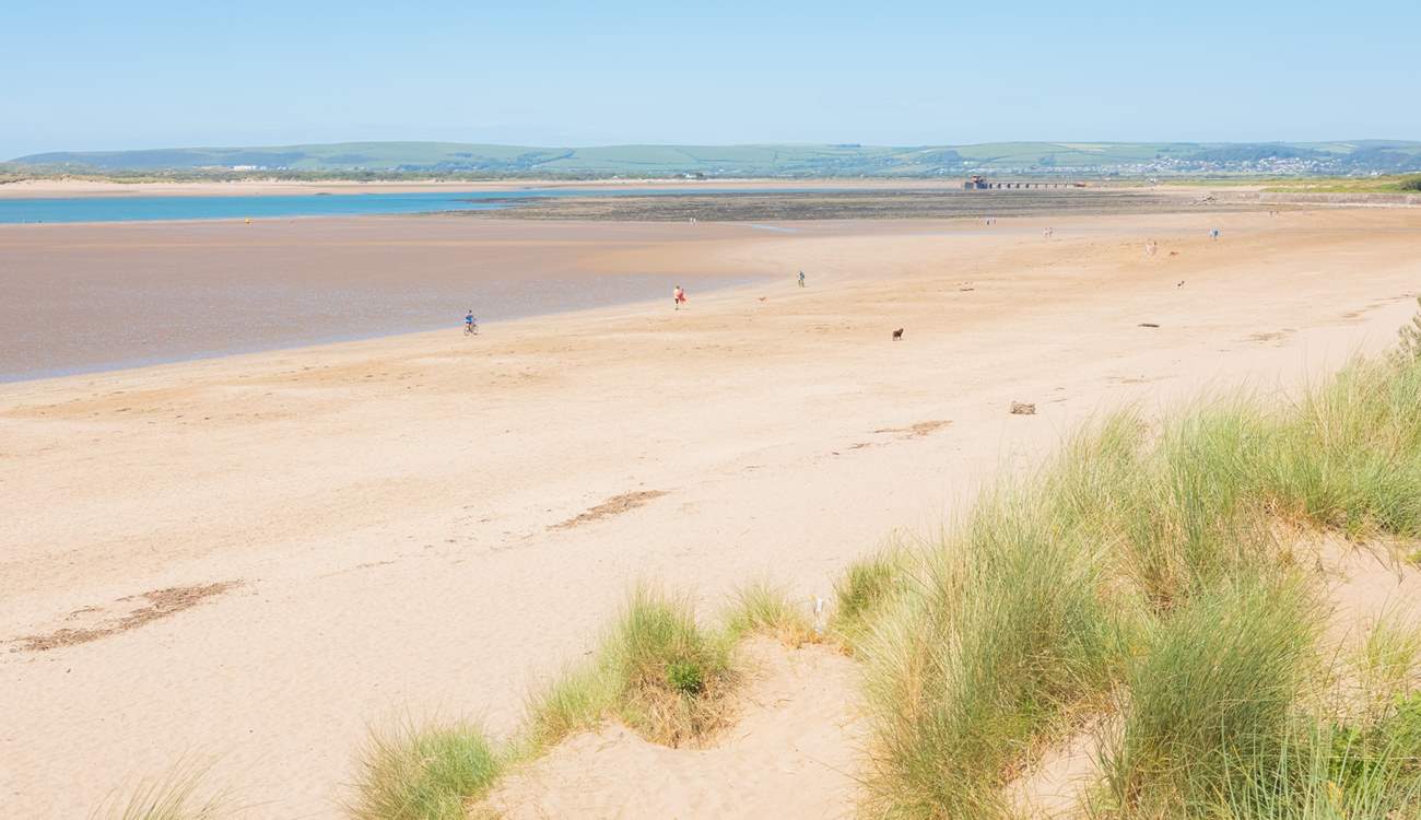 Instow beach has miles of sand and dog friendly year round.