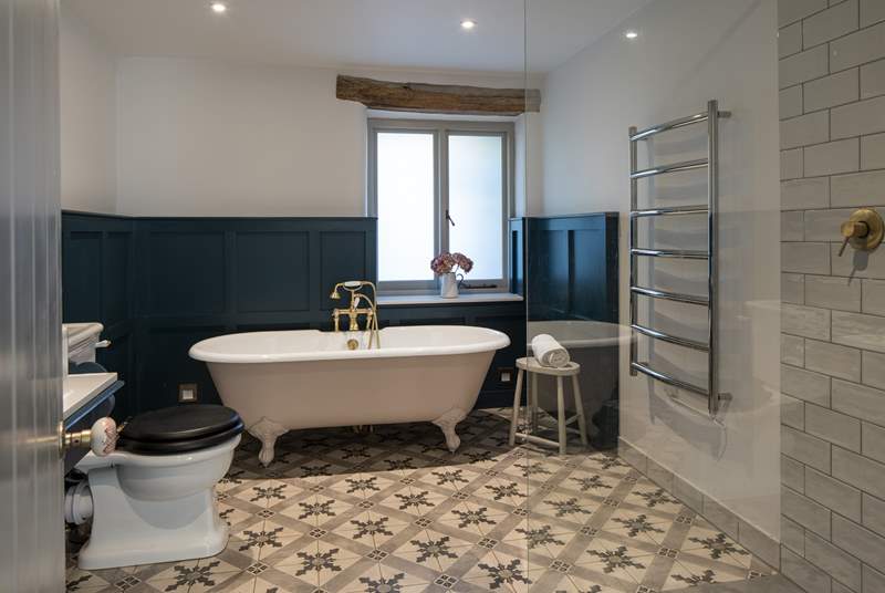 The family bathroom nestles in-between Bedrooms 3 and 4 and is fully equipped with this glorious roll-top bath and huge walk-in shower.