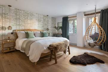 Bedroom 1 on the ground floor offers oodles of space and this super-king size bed.