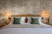 This super inviting super-king bed makes you want to dive right in.