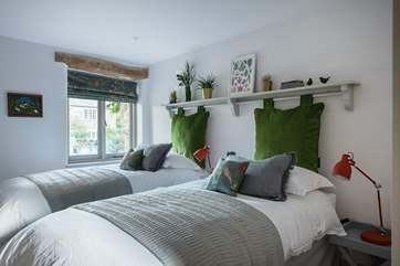 Bedroom 4 is so inviting. These 3 foot single beds can be configured together to transform into a super-king size double.