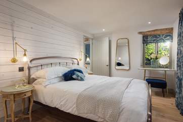 Bedroom 5 not only has a delightful private courtyard; this king-size bedroom also offers an exceptionally attractive en suite.