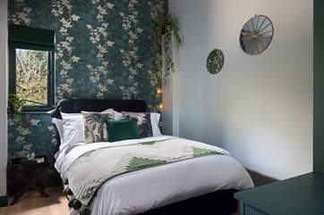 Bedroom 2 is beautifully decorated.
