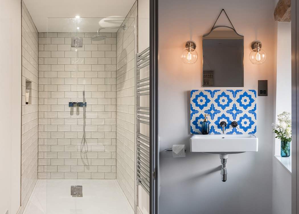 The en suite to Bedroom 5 is equipped with a large shower cubicle with tasteful design throughout.