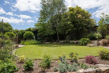 Enjoy a spot of dining al-fresco whilst the younger more energetic members of the group burn off a little steam on this lovely front lawn.