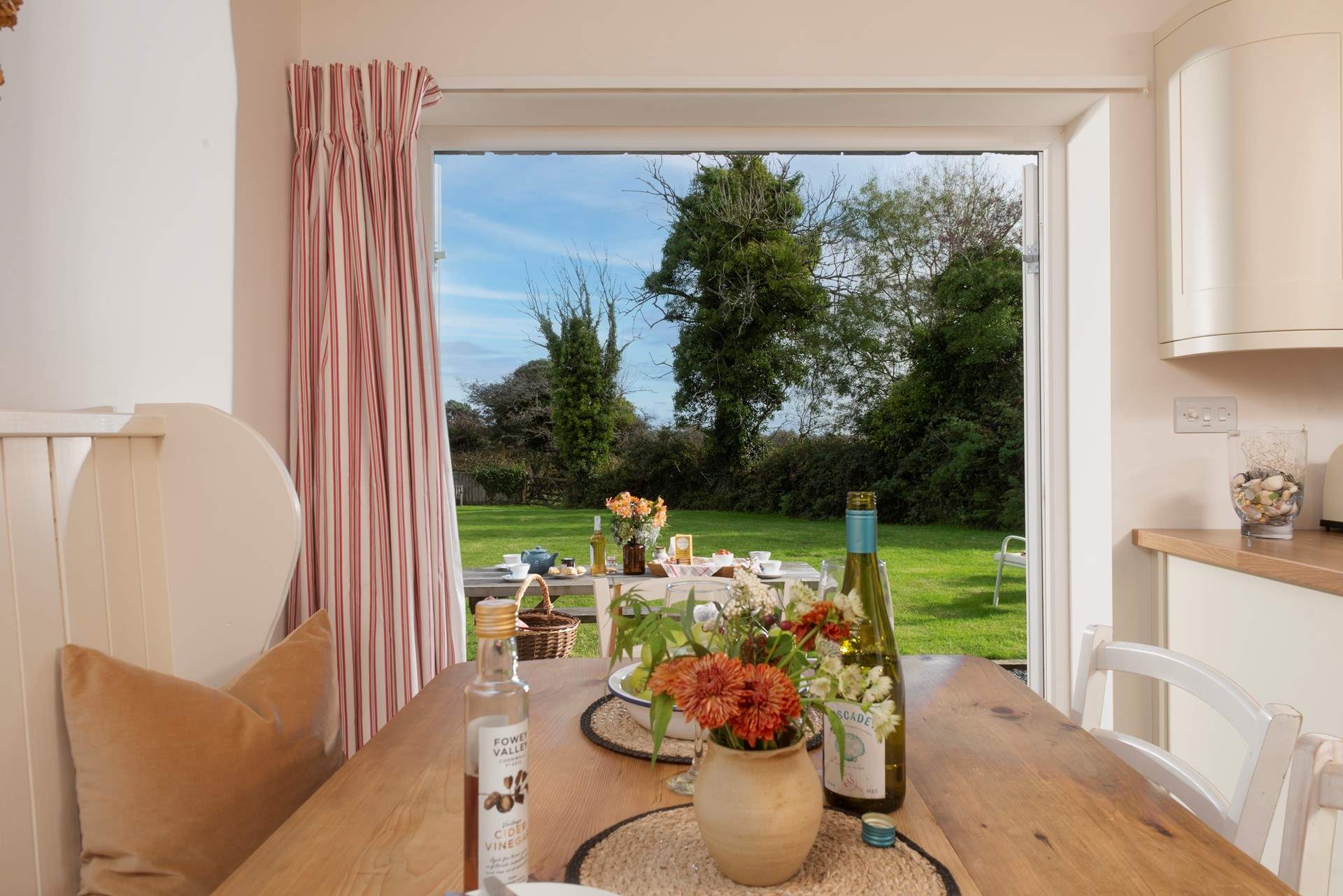 French doors open up onto the patio and garden.
