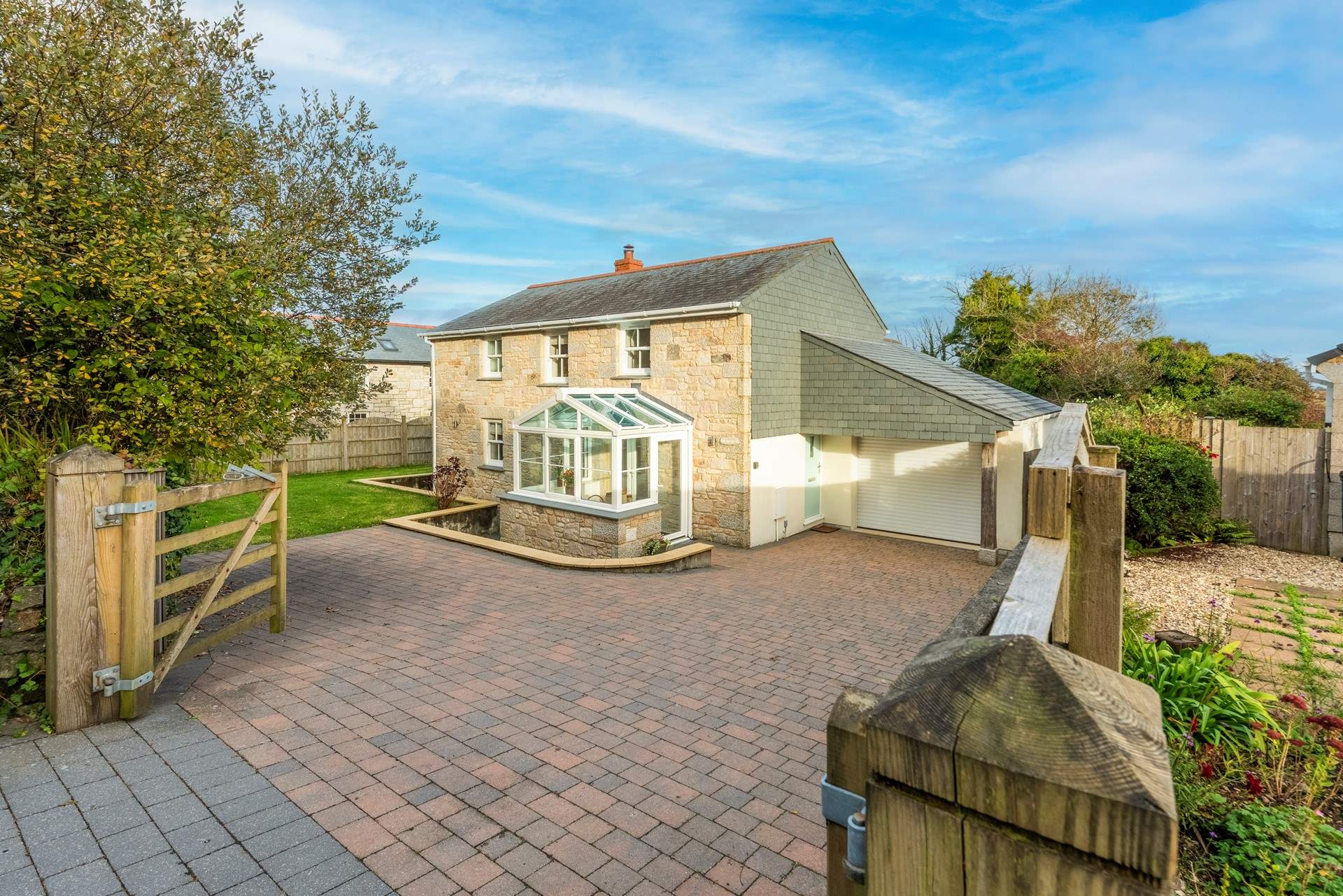 The front elevation and spacious driveway.