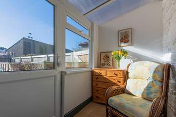 The sun-room overlooks the terrace.