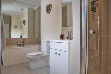 First floor bathroom with separate shower cubicle.