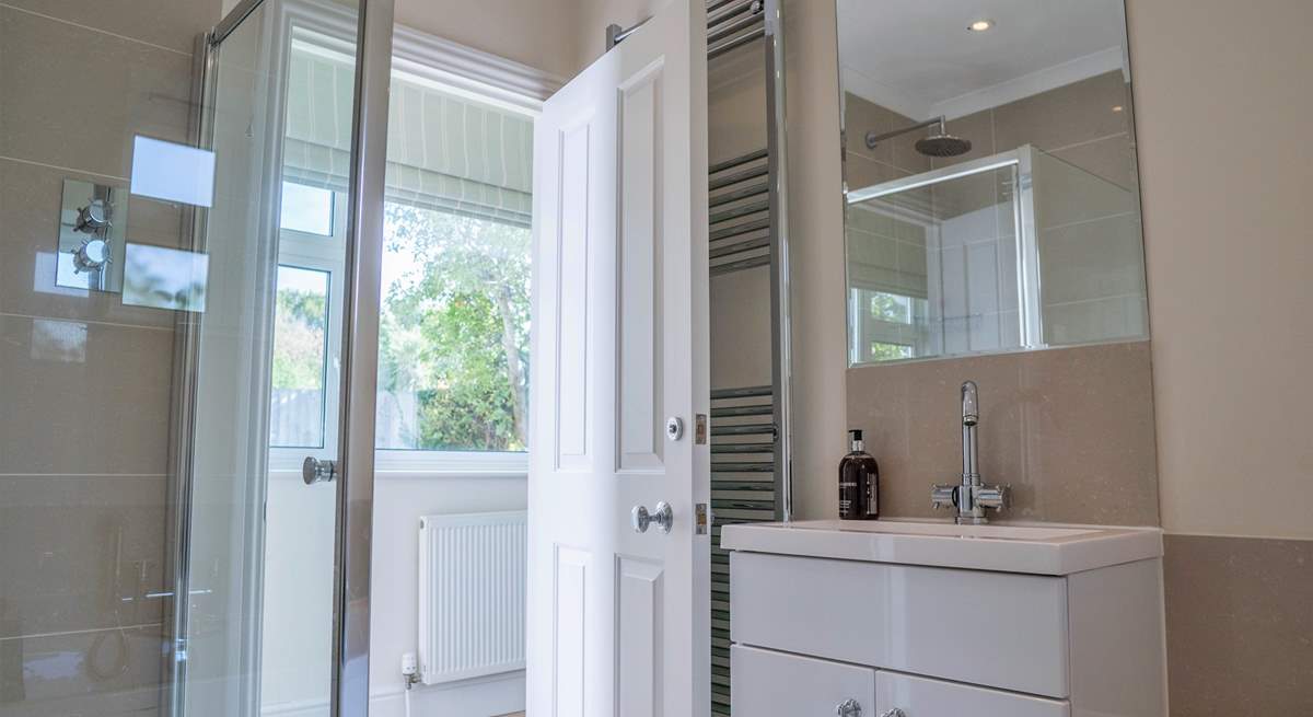 The ground floor bathroom with separate shower cubicle.