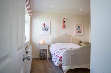 Ground floor double bedroom with king-size bed.