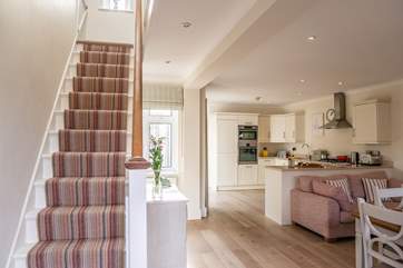 With lots of light flooding through, you will be very happy in this home from home.