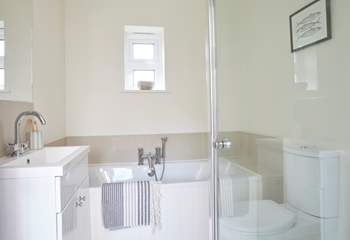 Ground floor bathroom with separate shower.