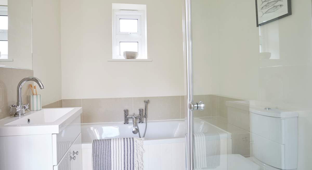 Ground floor bathroom with separate shower.