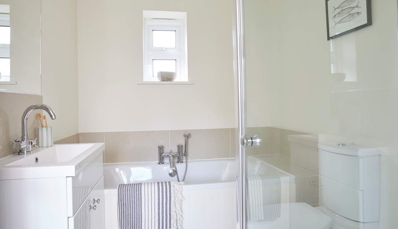 Ground floor bathroom with separate shower.