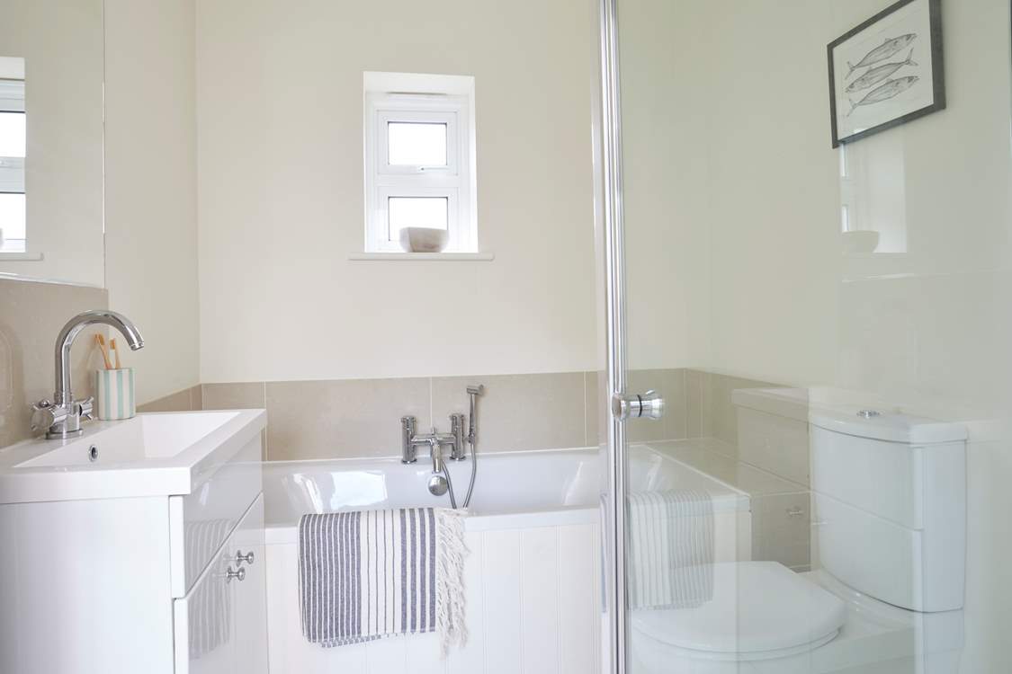 Ground floor bathroom with separate shower.