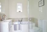 Ground floor bathroom with separate shower.