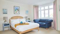 The light and airy first floor bedroom with king-size bed.