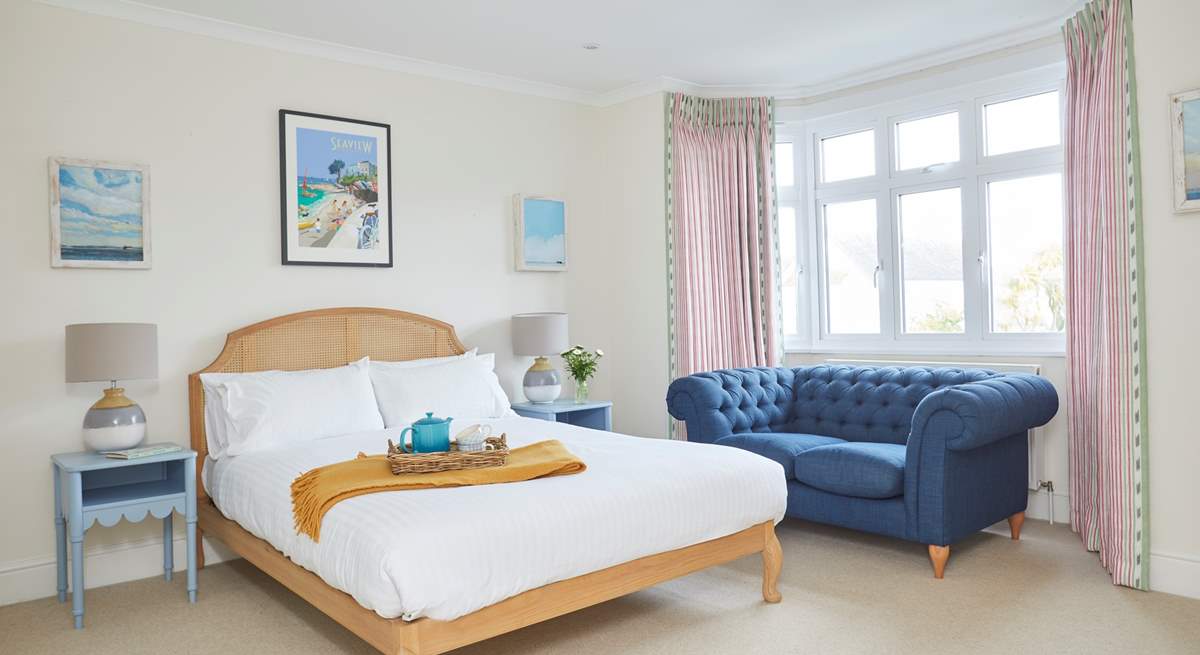 The light and airy first floor bedroom with king-size bed.