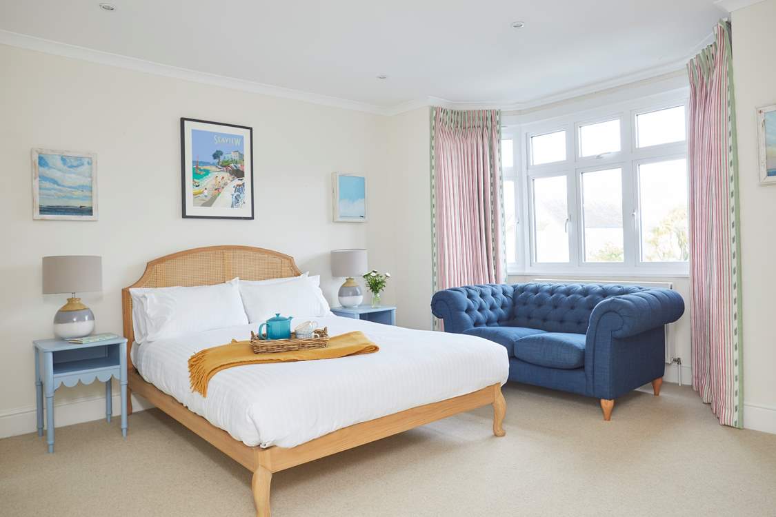 The light and airy first floor bedroom with king-size bed.