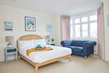 The light and airy first floor bedroom with king-size bed.
